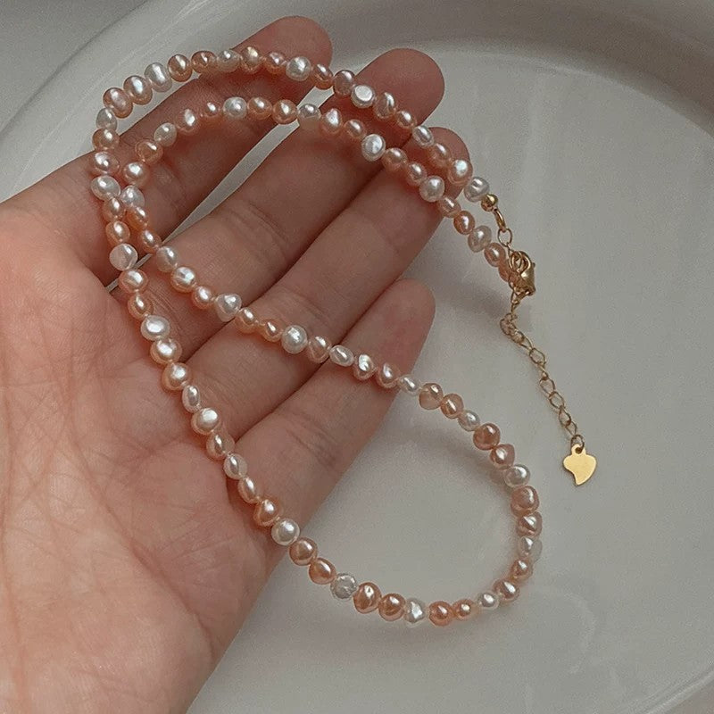 ApeXher – A Duet of Hair and Pearls