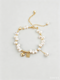 Discover the charm of lucky heart & baroque freshwater pearls. This misaligned irregular bead bracelet is an exquisite gift for women. Unique & meaningful. Shop now on Shopily. - New Hair