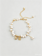 Discover the charm of lucky heart & baroque freshwater pearls. This misaligned irregular bead bracelet is an exquisite gift for women. Unique & meaningful. Shop now on Shopily. - New Hair