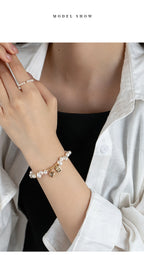 Discover the charm of lucky heart & baroque freshwater pearls. This misaligned irregular bead bracelet is an exquisite gift for women. Unique & meaningful. Shop now on Shopily. - New Hair